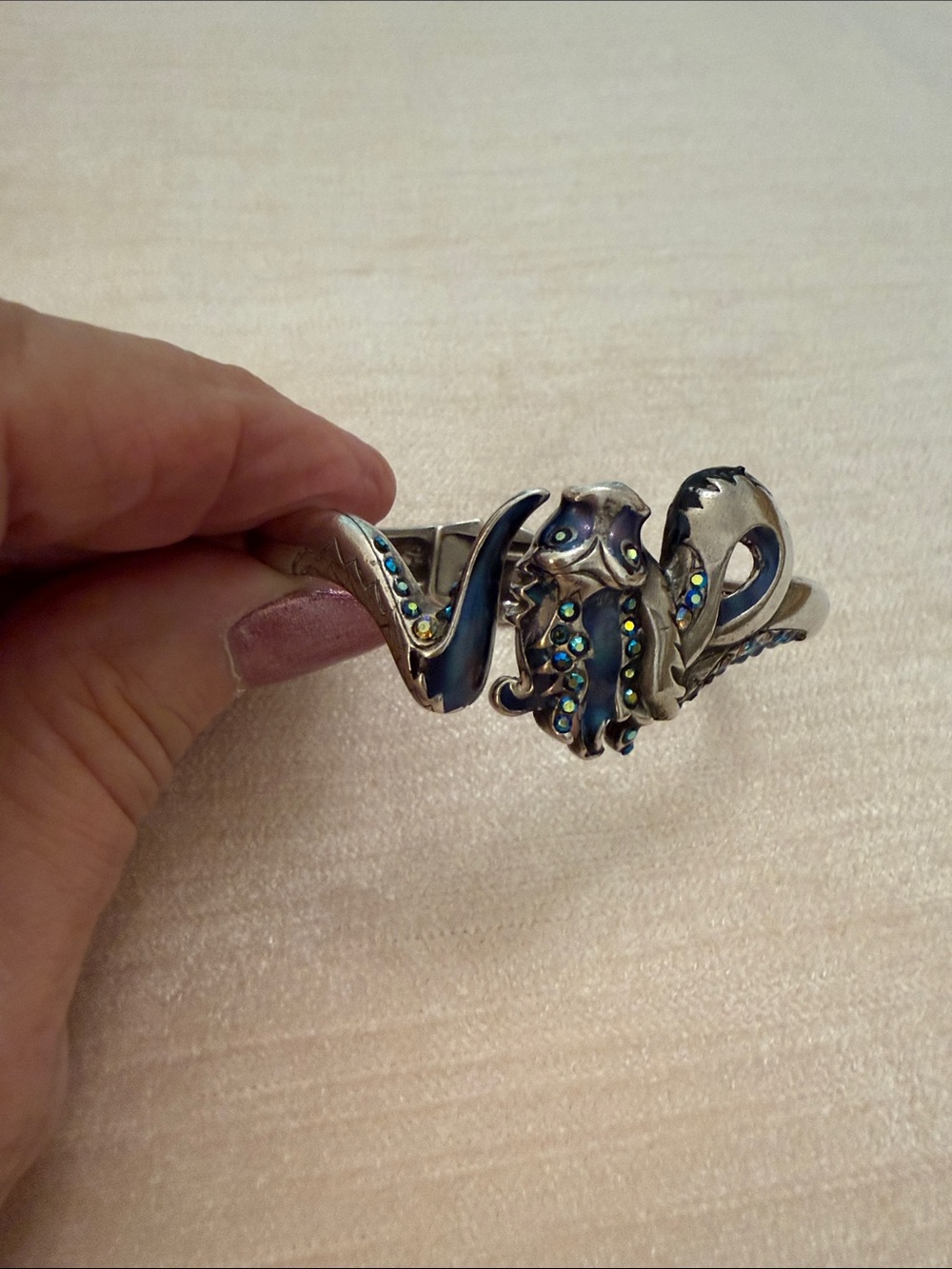 Chico’s water, dragon hinged Bracelet with Blue-Green Accents